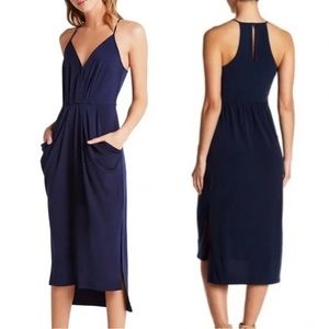 Size M ( but could fit a large) Bcbgeneration racerback navy dress w/ pockets!